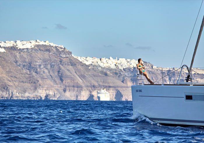 Young Woman On A Luxury Catamaran Santorini